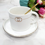 CHANEL Design Premium Tea Cup with Saucer and Golden Spoon - White